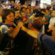 An anti-Occupy Central protester (left) argues with pro-democracy protesters on a main street at Hong Kong’s Mongkok neighborhood.